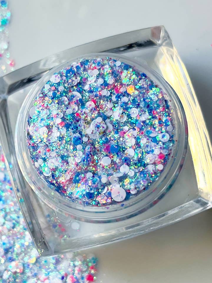 Neon Blue Pink and White Black Light Face and Body Glitter for wholesale by Nola Glitter Goddess
