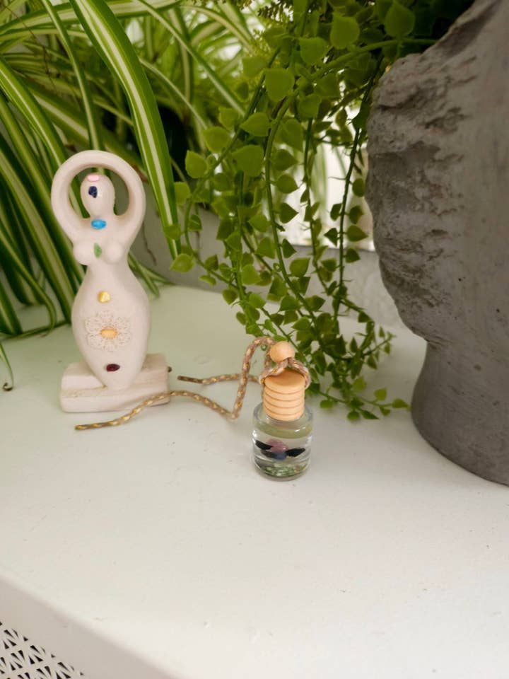 Rooted Calm Car Diffuser for wholesale by All Cheri's Intriguing Crystals LLC