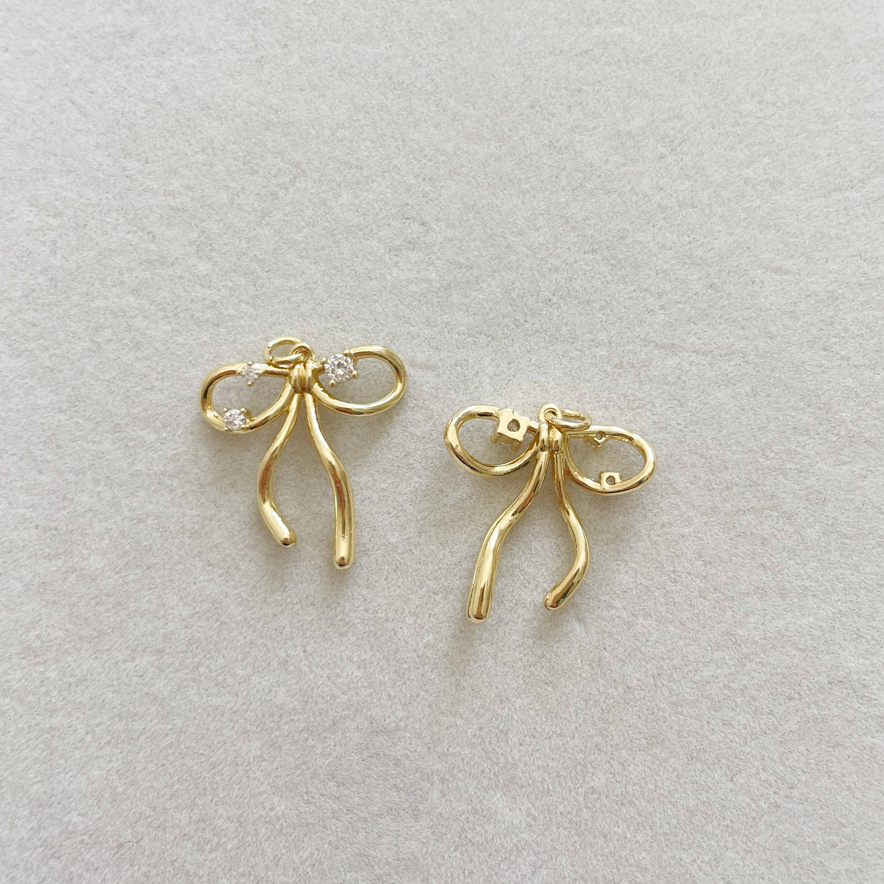 Goldie Charm Bar - Vente Breloques/médailles personnalisées - CHARM NŒUD ÉCLATANT1