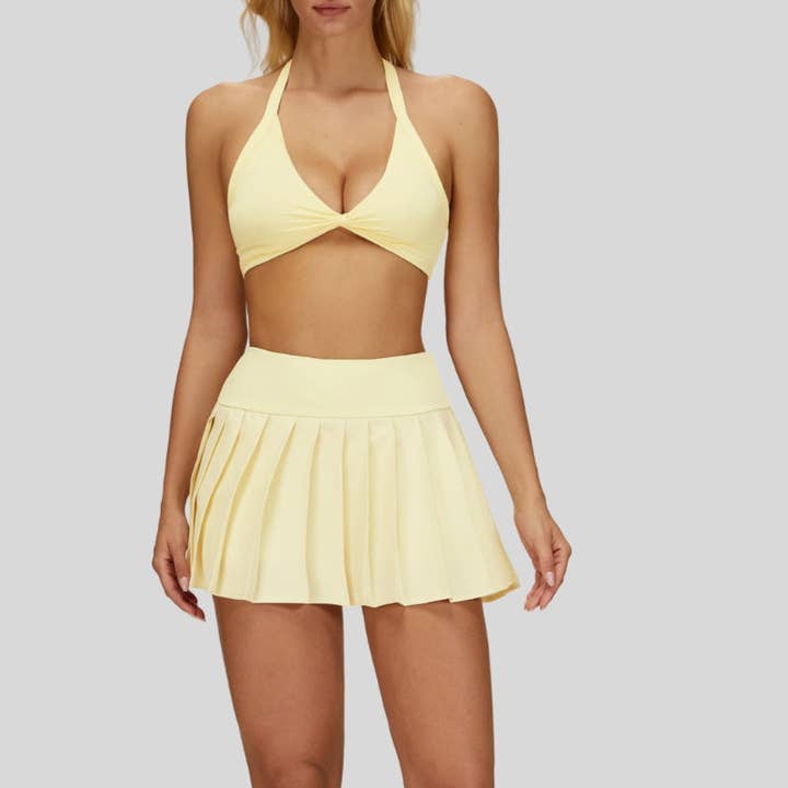 Soutien-gorge de sport amovible + Jupe plissée à design anti-exposition ensemble 2 pièces pour la vente par WONDERXFANS