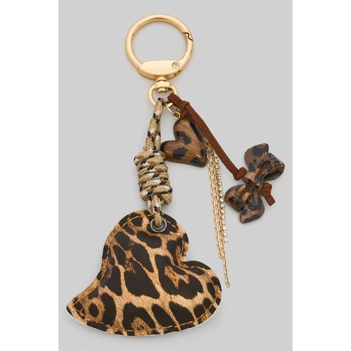 CIONDOLO PER BORSA CON CUORE E FIOCCO STAMPA LEOPARDO per la vendita all'ingrosso da parte di Girly