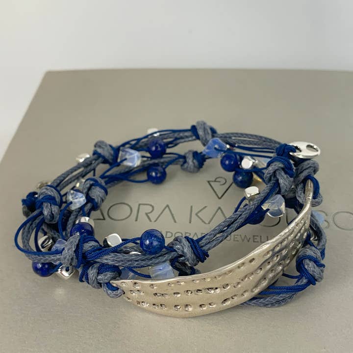 Smeltede sølvarmbånd med snor for engroshandel hos Dora kapousouzi Jewellery