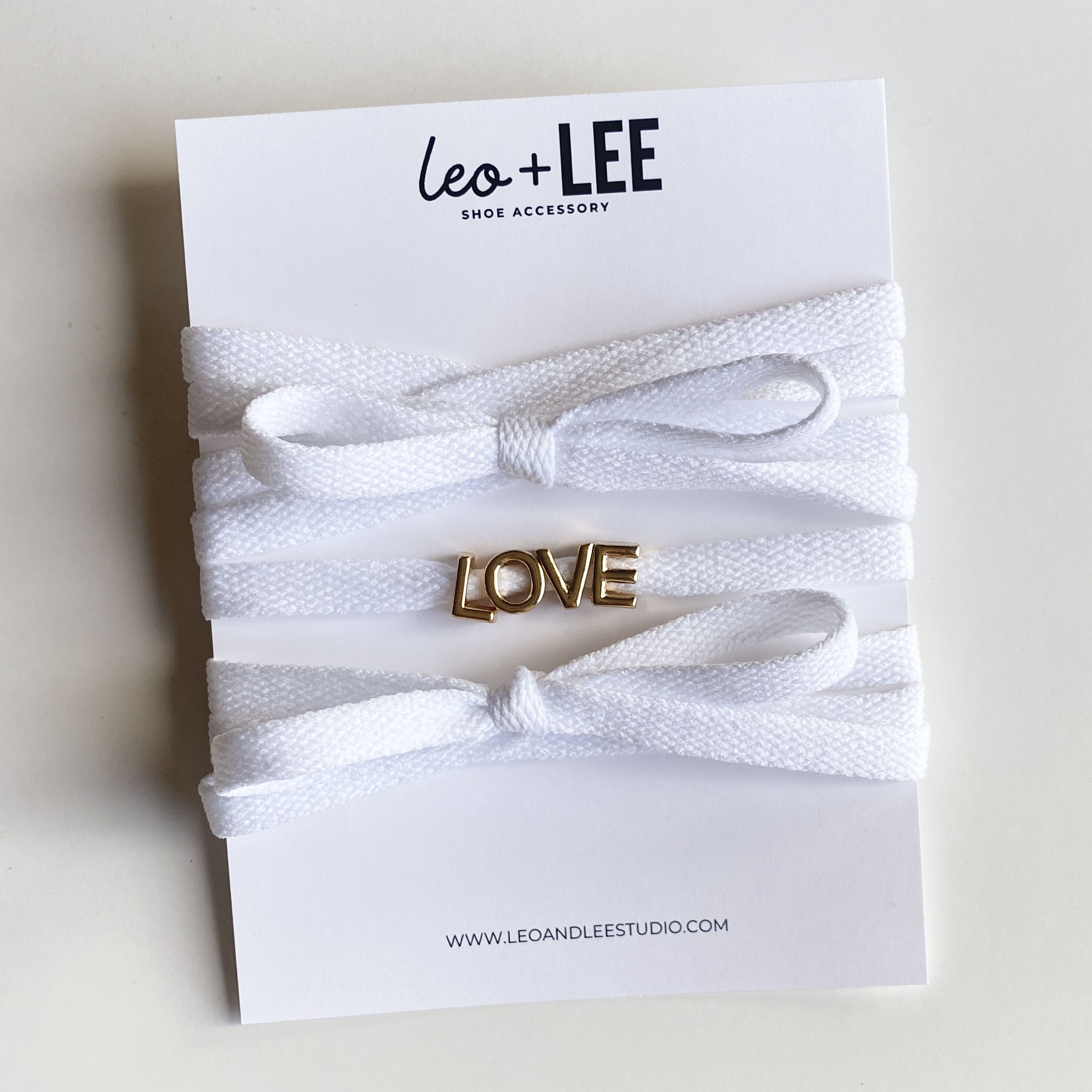 Leo & Lee Studio - Wholesale Shoelaces - Unisex - Love Sneaker Charm Sets - Gold LOVE with Red & White Laces3