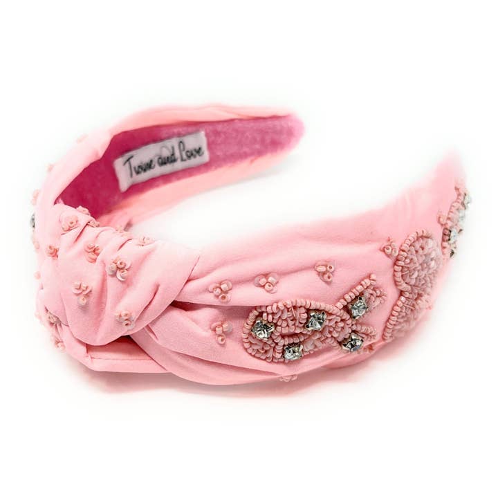 Handgefertigtes Stirnband mit rosa Perlen und Knoten. für den Großhandel von Twine and Love