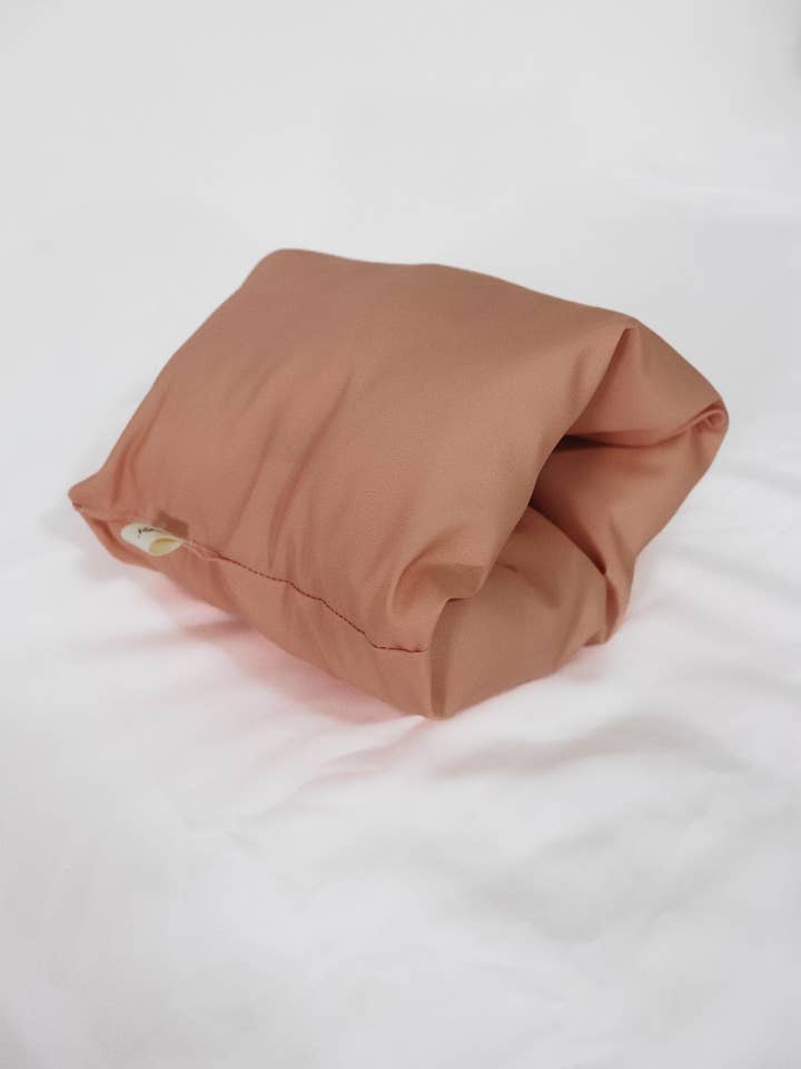 Ribbon Wipeable Cradle Arm Pillow for wholesale by Little Mae and Co