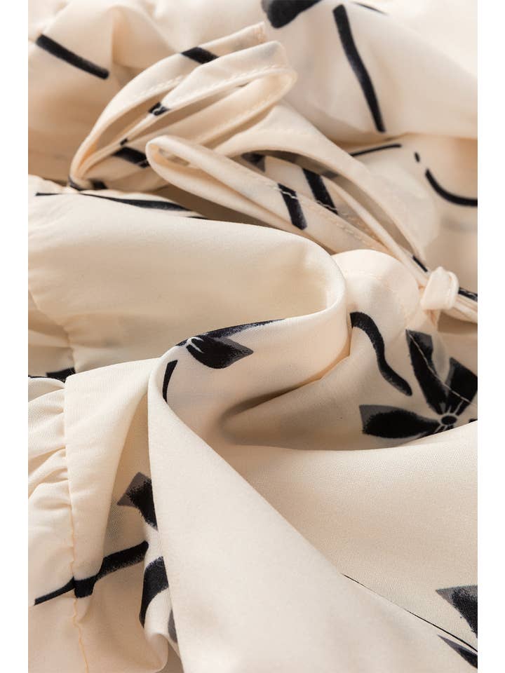 White Bow Tie Front Peplum Top for wholesale on Faire