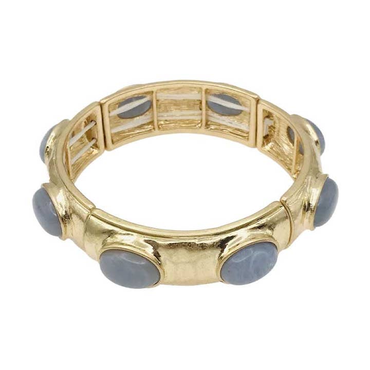 Or martelé avec accents ovales en pierre naturelle grise pour la vente par What's Hot