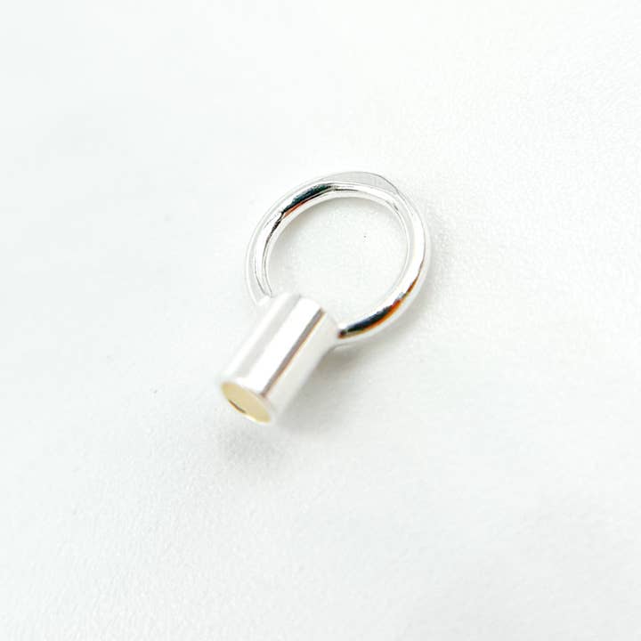 500079. 1.5MM White Sterling Silver Crimp Endcap with Ring for wholesale by Tresor Jewelry Inc.