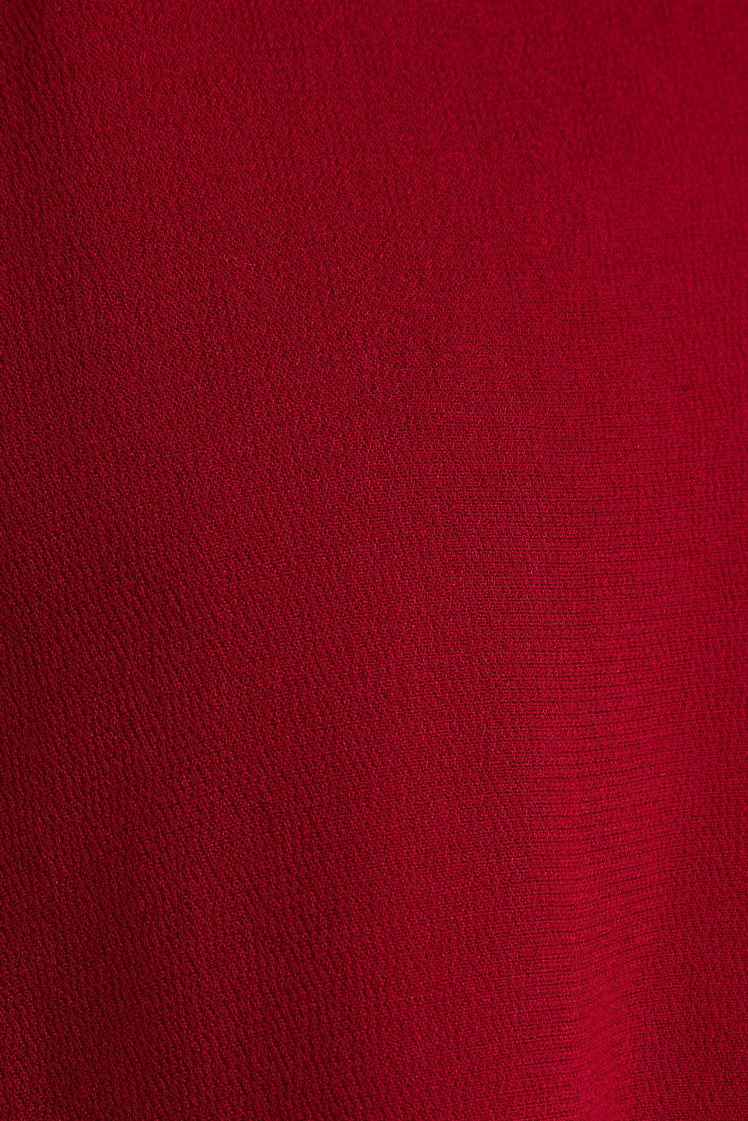 RUBIS Haut à manches longues avec encolure en V et ourlet à volants en vente sur Faire5