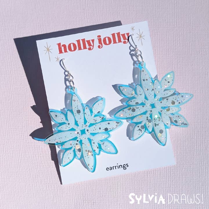 Snowflake Earrings - Iridescent Pastel Blue with Glitter for wholesale by Sylvia Draws