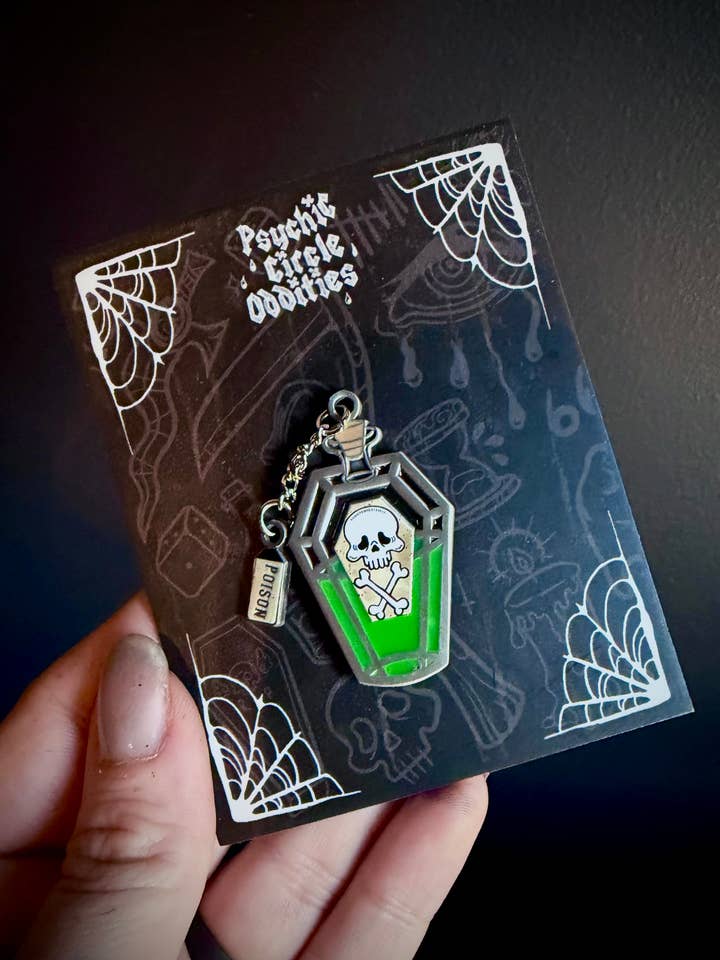 Poisoned Glow-in-the-Dark Enamel Pin | Gothic Coffin Poison for wholesale by Psychic circle oddities