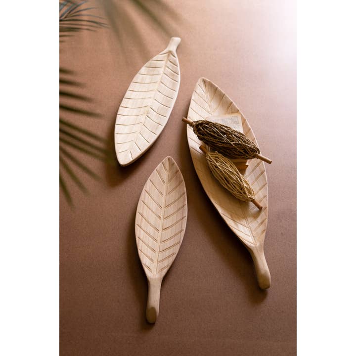 Natural SET OF THREE WOODEN LEAF TRAYS for wholesale on Faire2