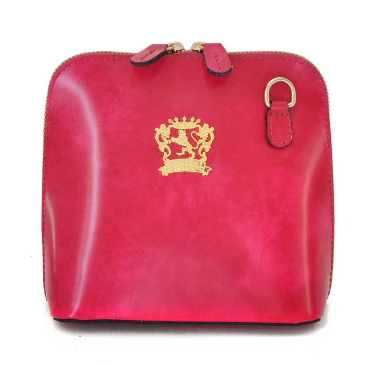 Volterra Radica Koeienleren Clutches Fuchsia voor wholesale door Pratesi