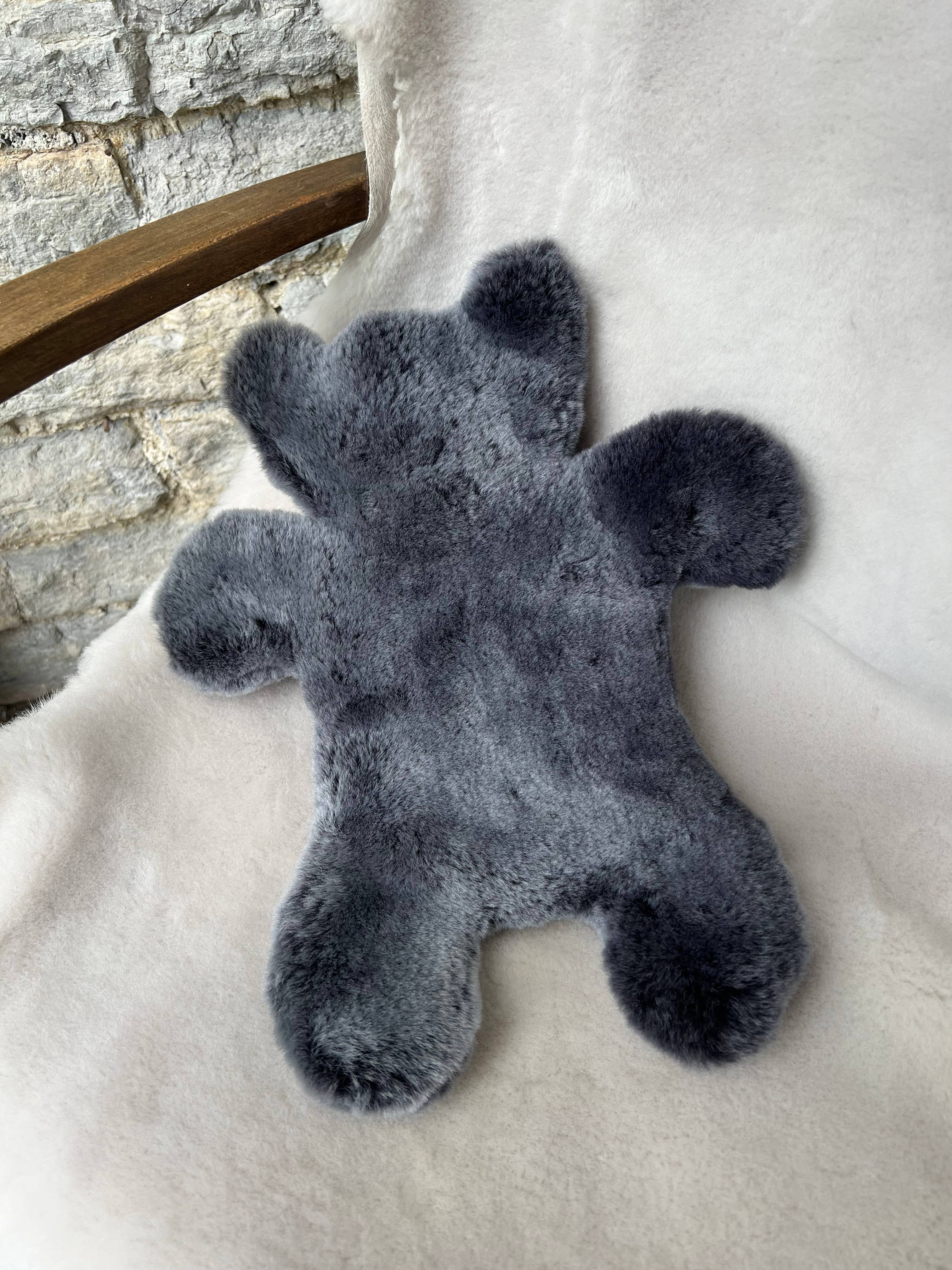 Owen Barry Ltd - Venta al por mayor Compresas de frío/calor - Botella de agua caliente con funda de piel de oveja | Flat Eric de Owen Barry1