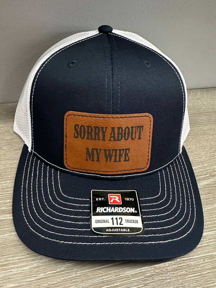 Sorry About My Wife Men's Richardson 112 Trucker Hat for wholesale by Designed To Flaunt