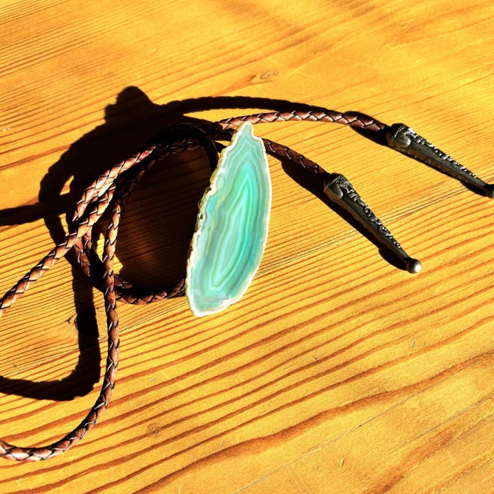 mahogany cord pewter tips Sage Bolo Tie for wholesale on Faire