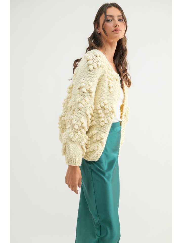 CREAM HAND-KNIT POM-POM HEART CARDIGAN / WL24-9723 for wholesale on Faire