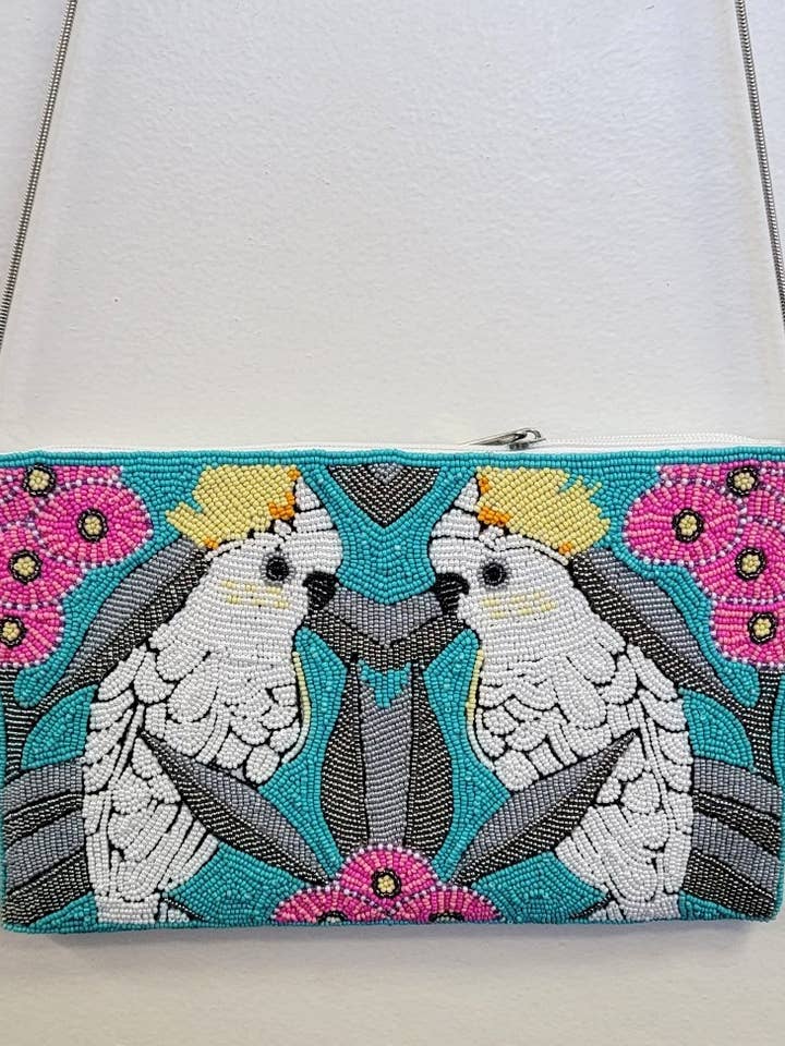 PERLENBESETZTES CLUTCH MIT ZWEI VÖGELN für den Großhandel von Ricki designs