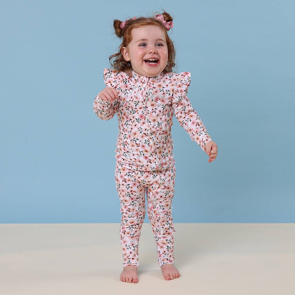 Snuggle Hunny – wholesale Nattdräkt – Baby – Vårblommig ekologisk snugglesuit konvertibel romper med volang2