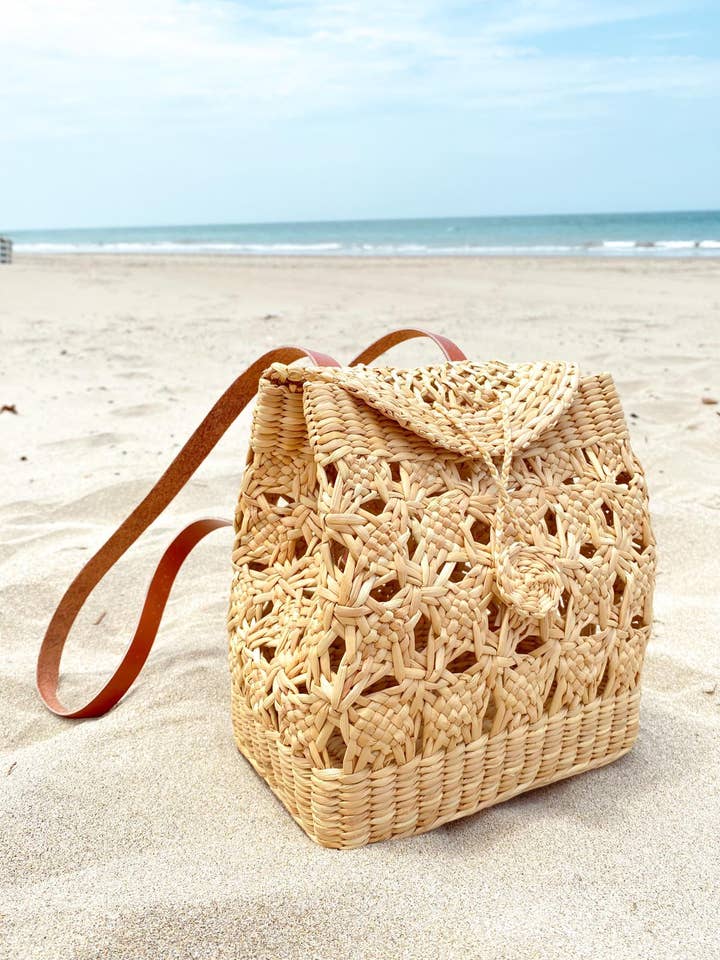 The Sol - Handmade Bohemian Beach Straw Bag with Backpack shape and leather straps. for wholesale by La Playa