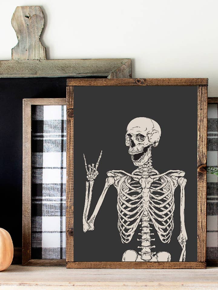 Rock on Skeleton Wooden Framed Sign for wholesale by Willie & Dolly Designs