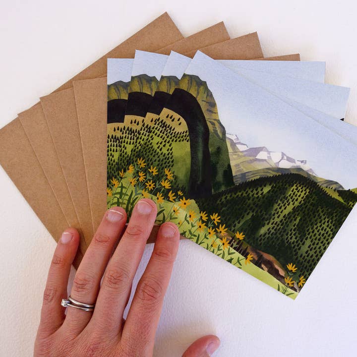 Set di otto biglietti di auguri per prato alpino per la vendita all'ingrosso da parte di May We Fly