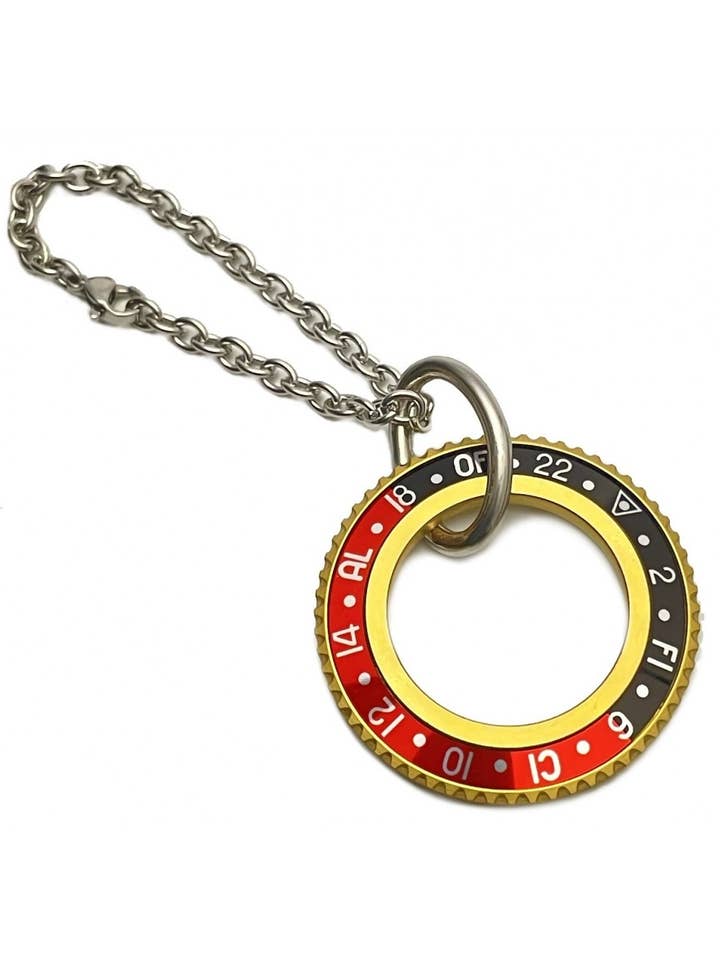 LLAVERO VELOCÍMETRO OFICIAL PVD ORO COLOR NEGRO/ROJO para venta al por mayor de Speedometer Official