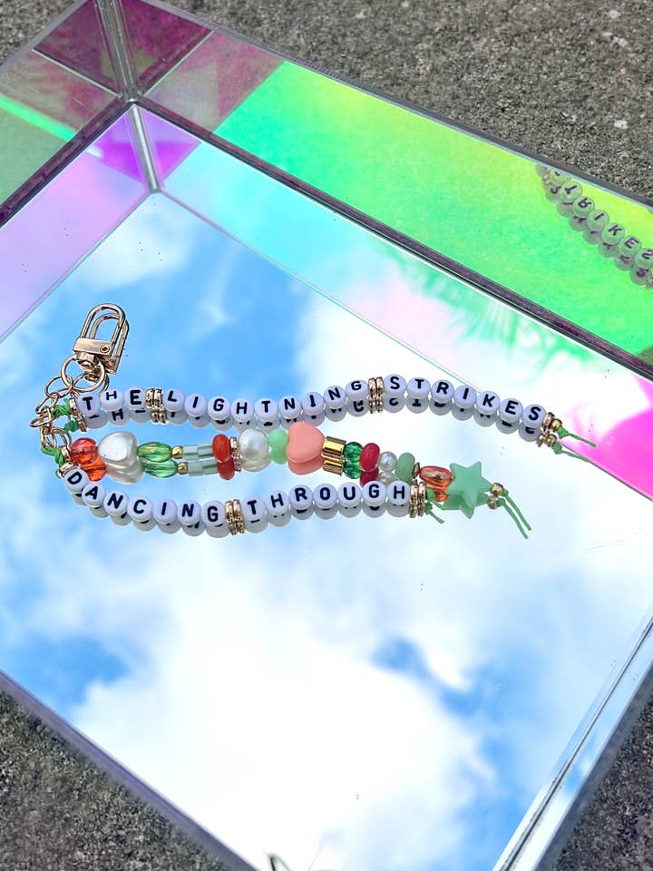 Dancing Through The Lightning Strikes Beaded Bag charm for wholesale by SHOP GASCO