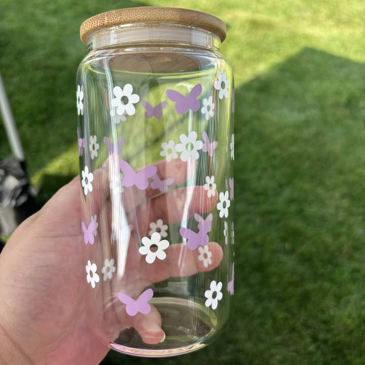 Butterfly and Mini Daisies - 16oz. Glass Tumbler with Bamboo Lid and Straw for wholesale by Clarity Goods