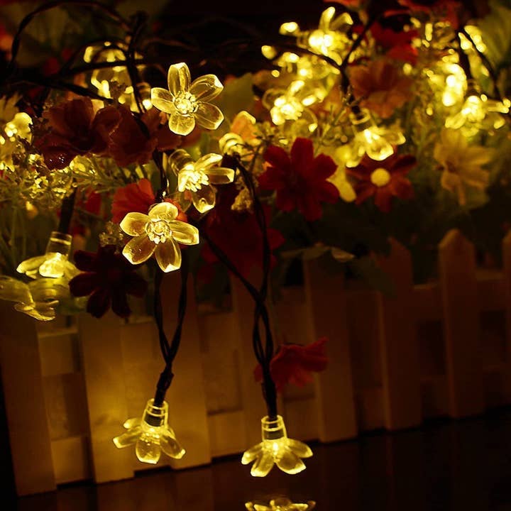 50 LED Clear Cable Cherry Blossom Solar Light - Warm White for wholesale on Faire