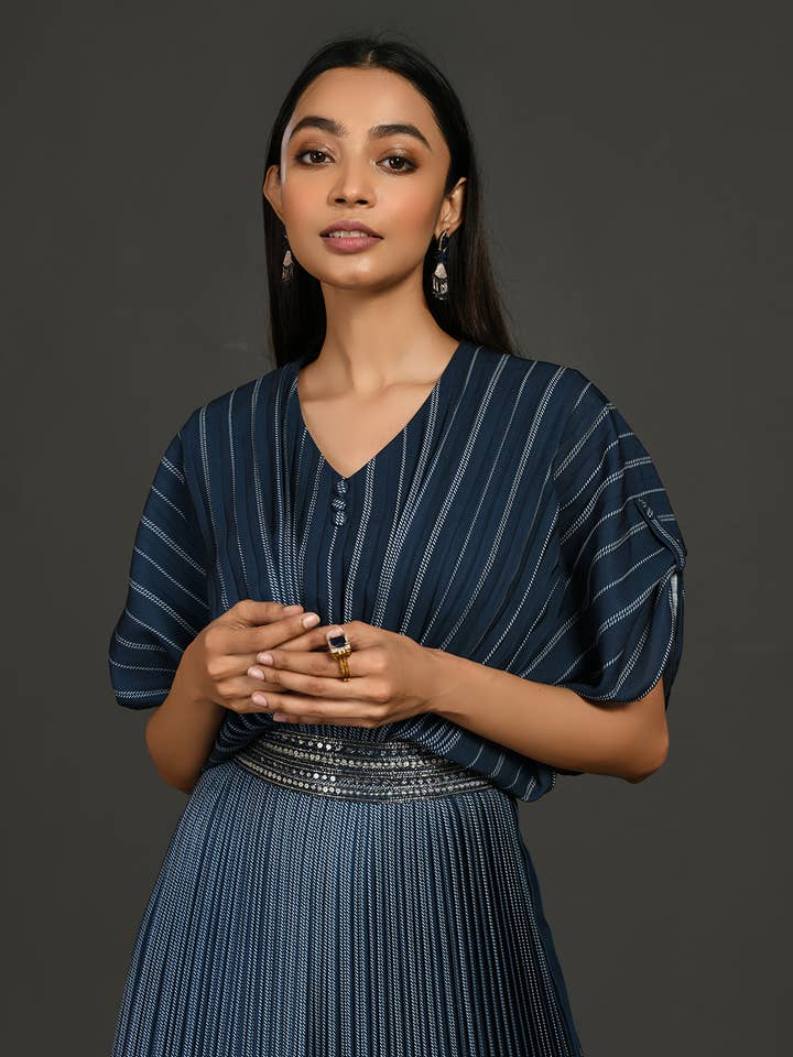 Satin Blue gathered pleated gown with metallic belt for wholesale by Onaya Fashions LLC