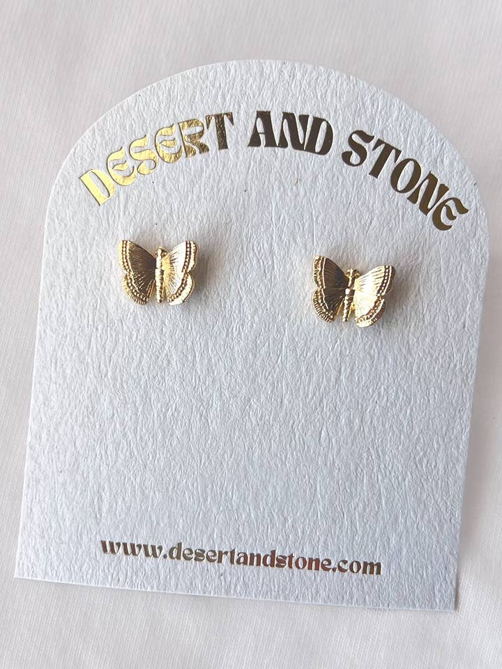 Clous d'oreilles en forme de papillon dorés pour la vente par Desert and Stone Jewelry