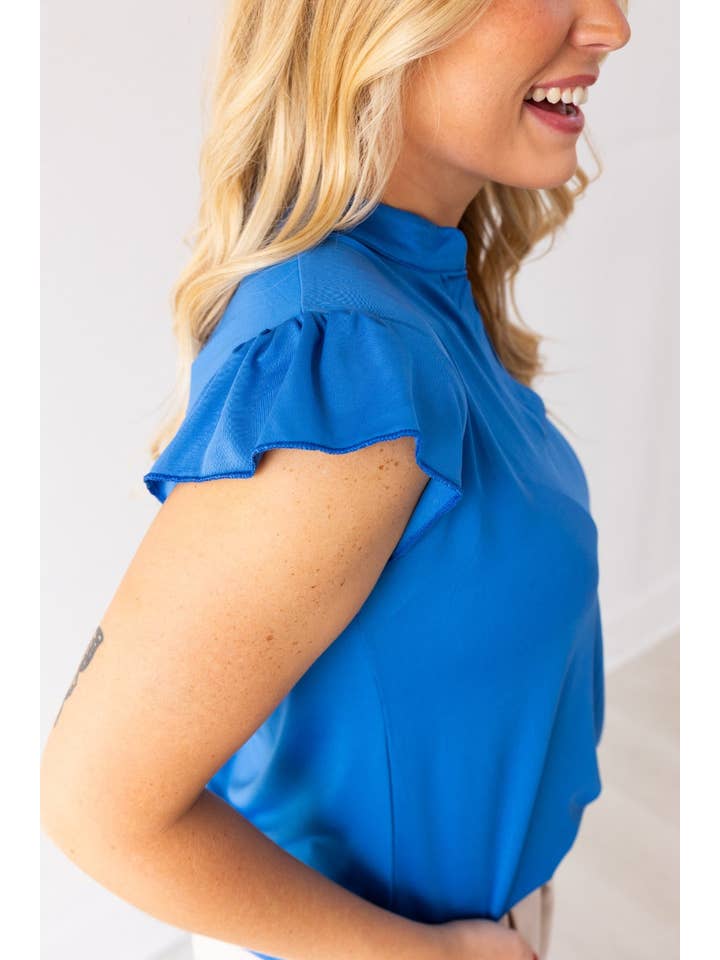 The Nicole V-Neck Top, Blue for wholesale on Faire