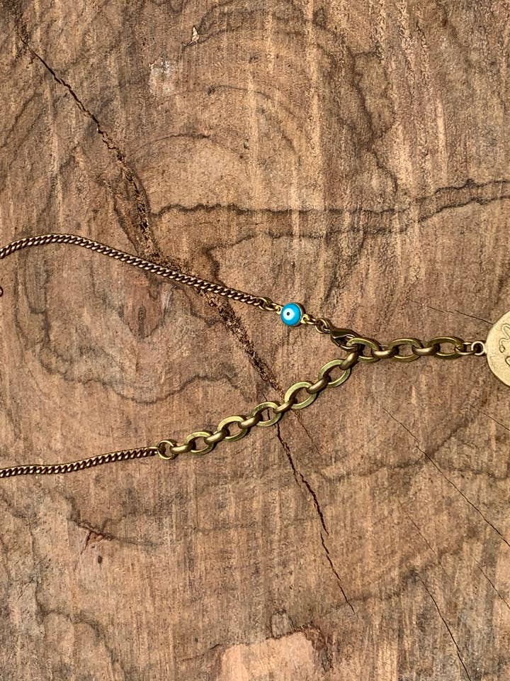 Médaillon grec, laiton vintage réglable mauvais œil pour la vente par Laborde Jewelry