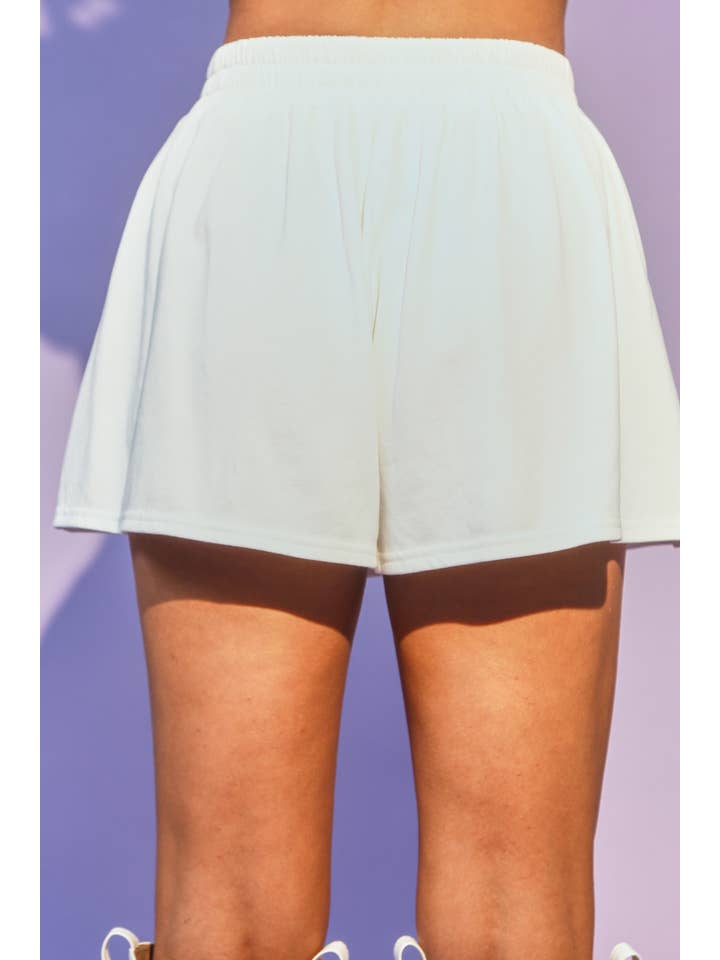 WHITE Mardi Gras Sequin Tiger Shorts for wholesale on Faire