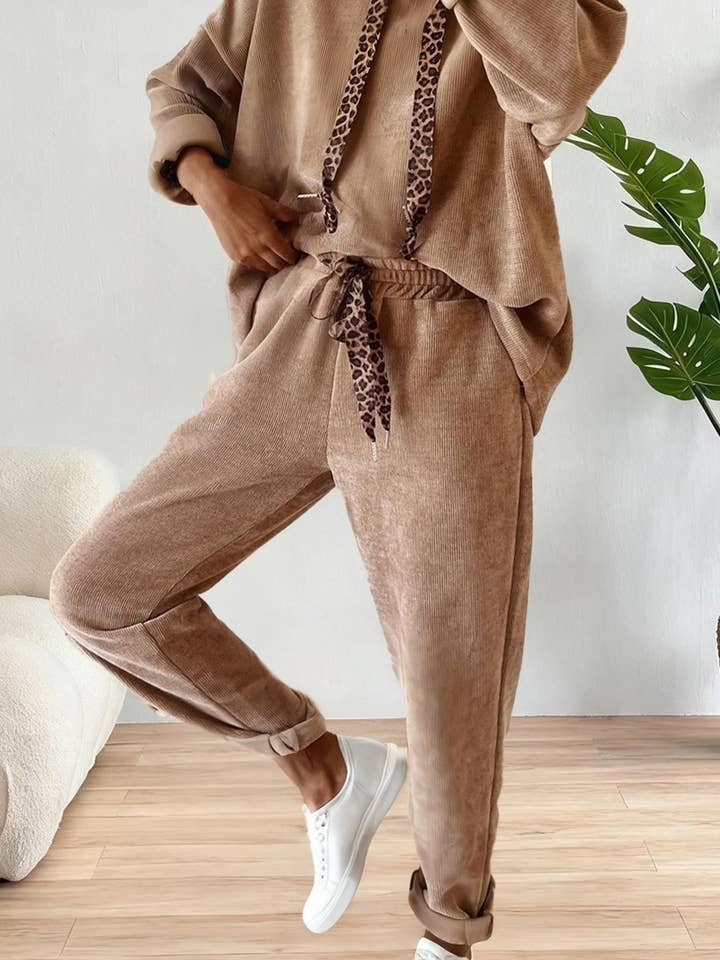 Drawstring Pullover Hoodie and High Waist Pants Corduroy Set and other Purchase Wholesale hoodie jogger set. Free Returns & Net 60 Terms on Faire trending on Faire.