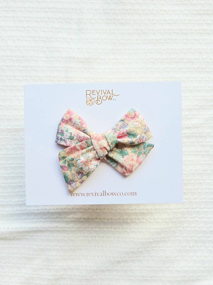 Small Handtied Bow on Clip / Beige Floral for wholesale by Revival Bow Co.
