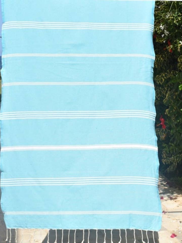 Fouta Mykonos blu celeste per la vendita all'ingrosso da parte di Fouta Tunisia