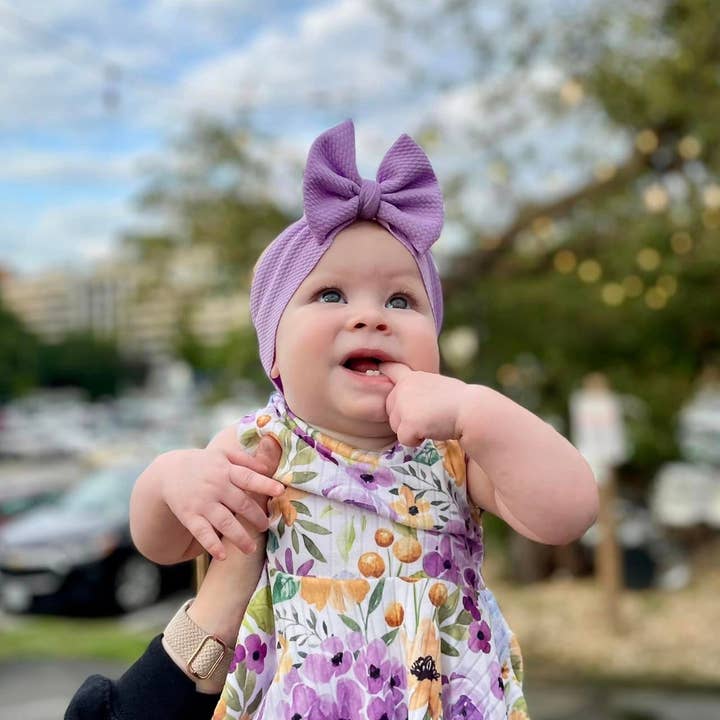 Purple Floral Peplum and Bummies Set for wholesale by Tiny toes Baby Co