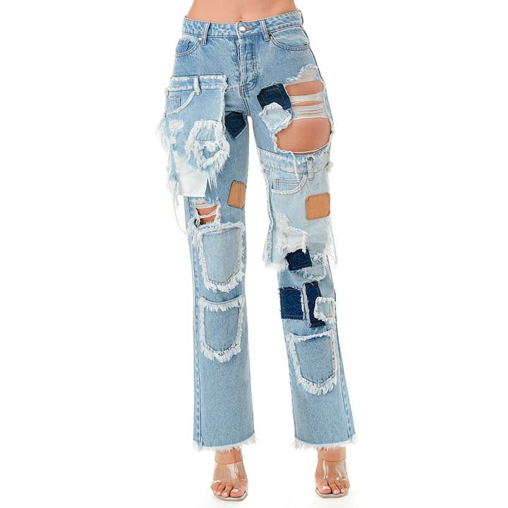 Pantalon en jean effiloché à ourlet brut entièrement patché pour la vente par omgstyles