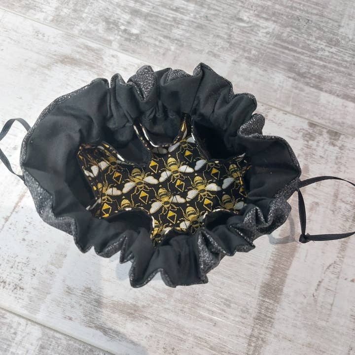 Jewellery Pouch in Black Glitter with Contrast Bee Print Lining | Compact Travel Storage for wholesale by Olganna Ltd