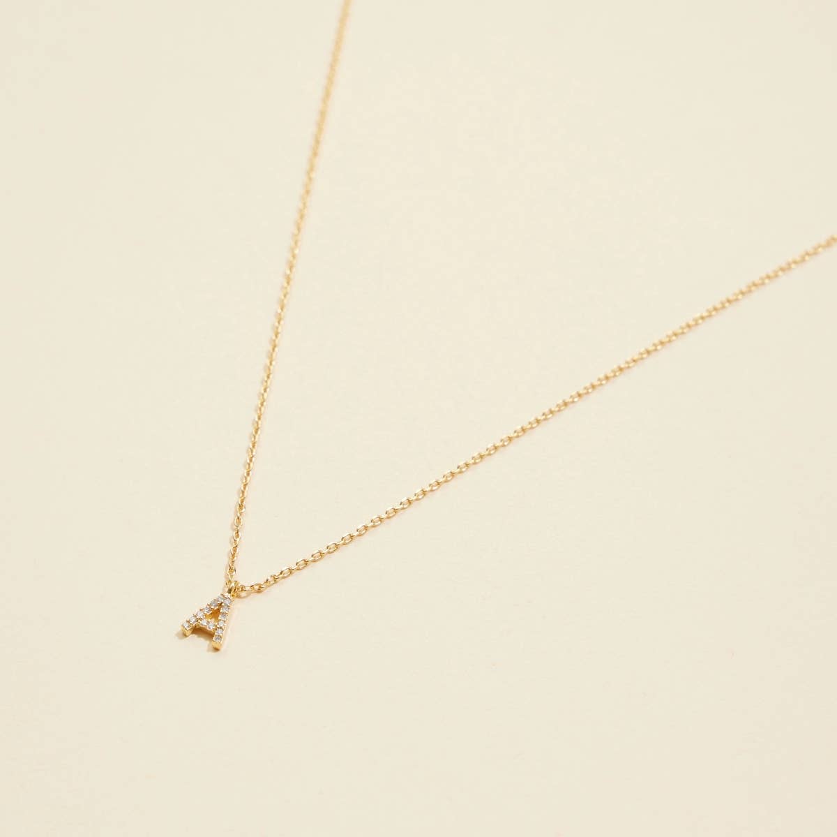 Lilla Haven - Wholesale Pendant/Charm Necklace - 12 Pack of Cubic Zirconia Initial Gold Dipped Necklaces1