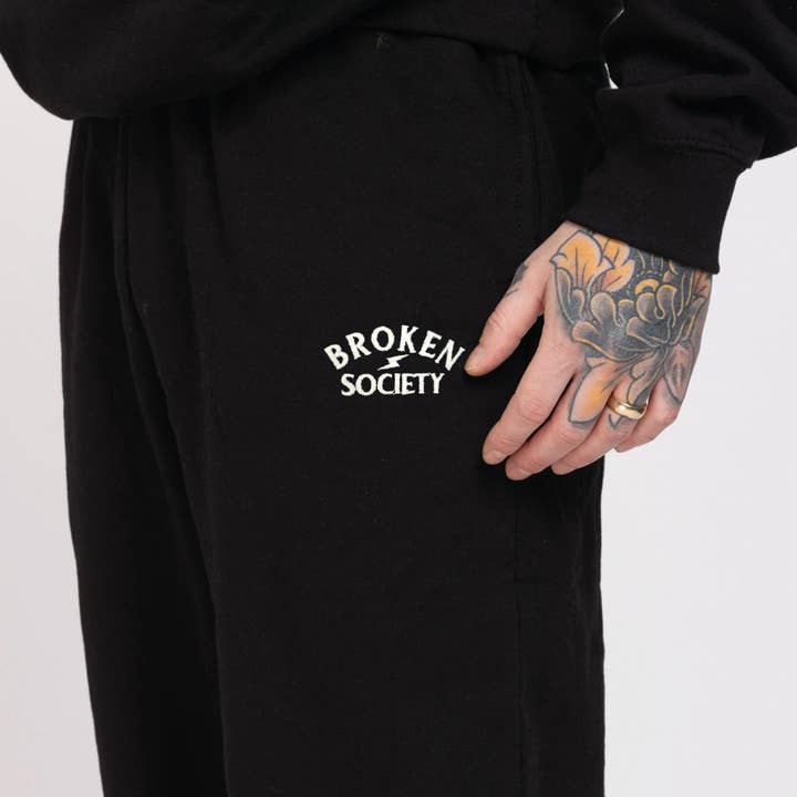 Broken Society joggingbroek met borduursel (uniseks) voor wholesale door Broken Society