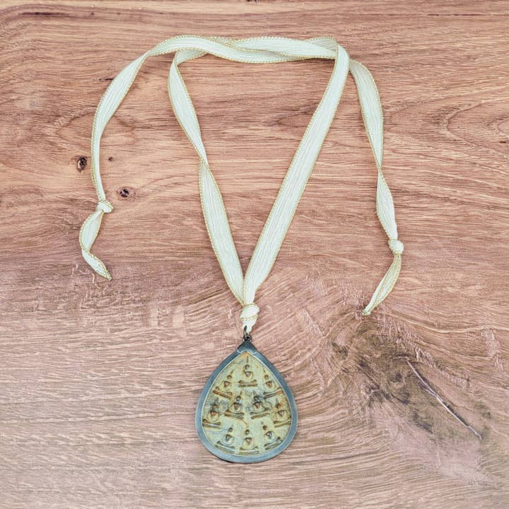 Sitting Buddhas Silk Ribbon Necklace for wholesale by ZINC Designs
