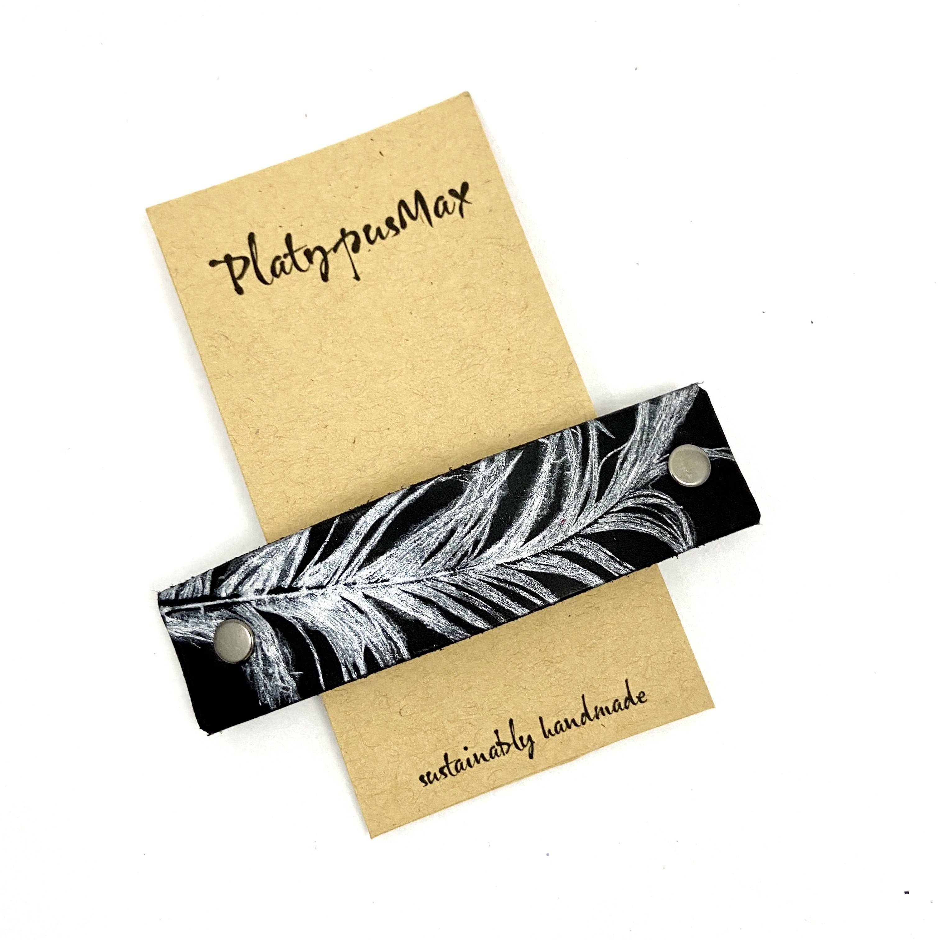 PlatypusMax - Wholesale Barrette - Women's - Silver Feather on Black Leather Hair Barrette0