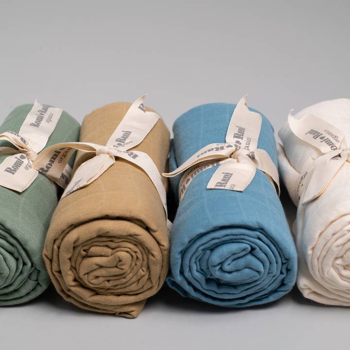 100% Organic Cotton Muslin Swaddle for wholesale by Sleep & Beyond