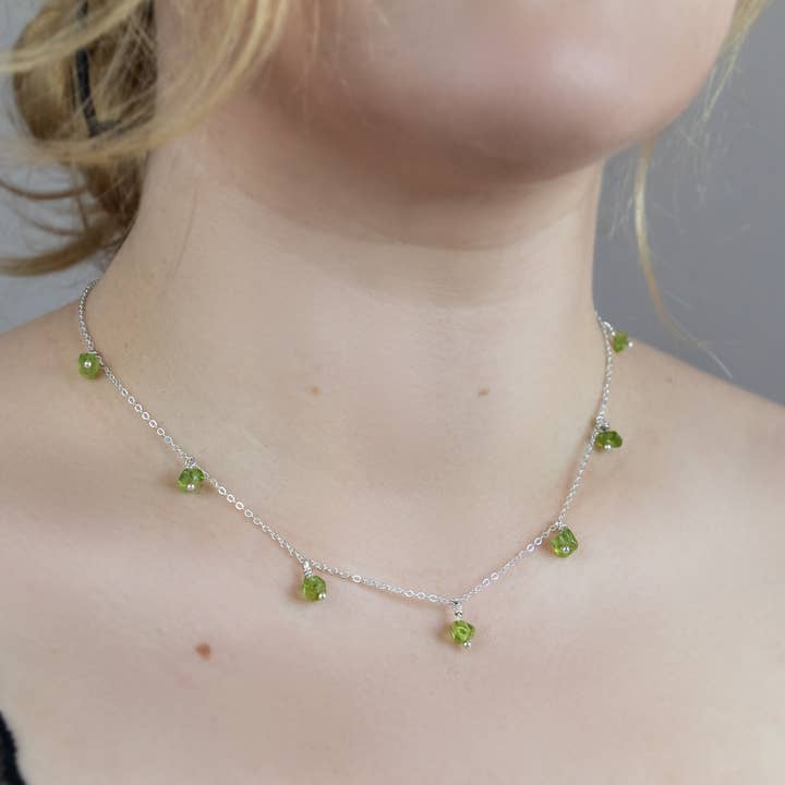Dainty Peridot necklace with raw crystal beads for wholesale by Allie and Posie