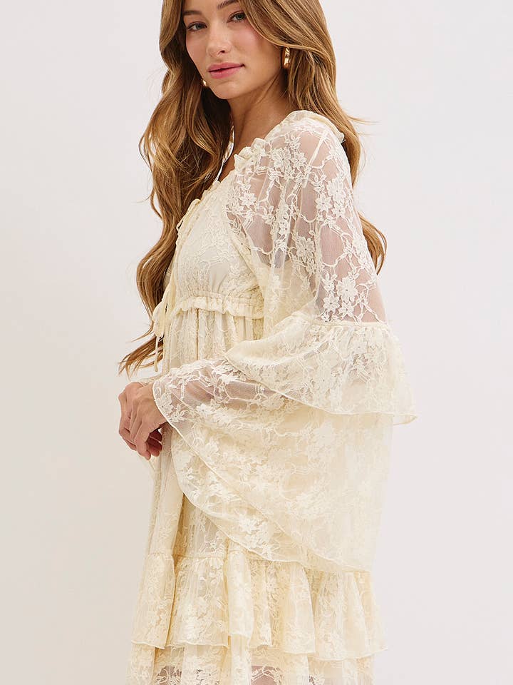 VANILLA RUFFLE LAYERED BELL SLEEVE LACE DRESS for wholesale on Faire
