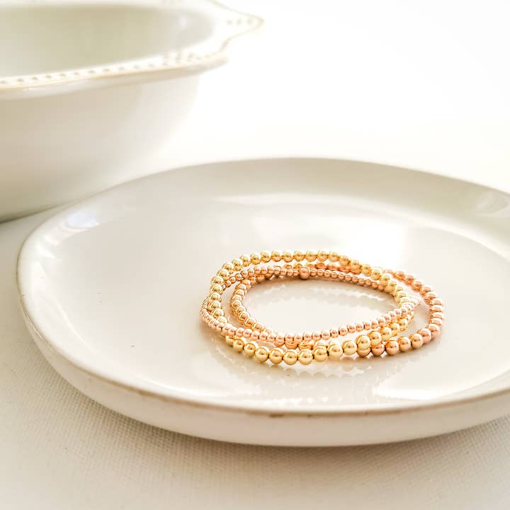 Zierliches 3 mm goldgefülltes/dehnbares Armband aus Sterlingsilber für den Großhandel von GiGisPetals
