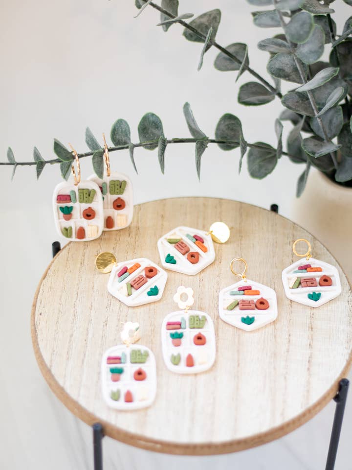 Book Shelf Dangles for wholesale by EJ Clay Co